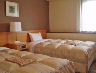 Hotel Route-Inn Suzuka Habitación foto